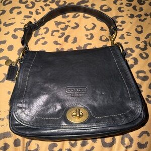 Coach No. E0769-11134 vintage Legacy Flap/ Saddle bag